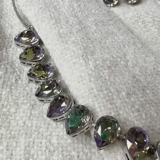 beautifully crafted Sworaski crystals necklace set with studs/wedding /silver plated/rhodium finish adjustable.