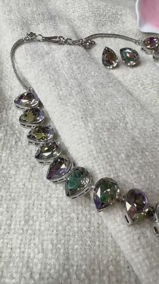 beautifully crafted Sworaski crystals necklace set with studs/wedding /silver plated/rhodium finish adjustable.