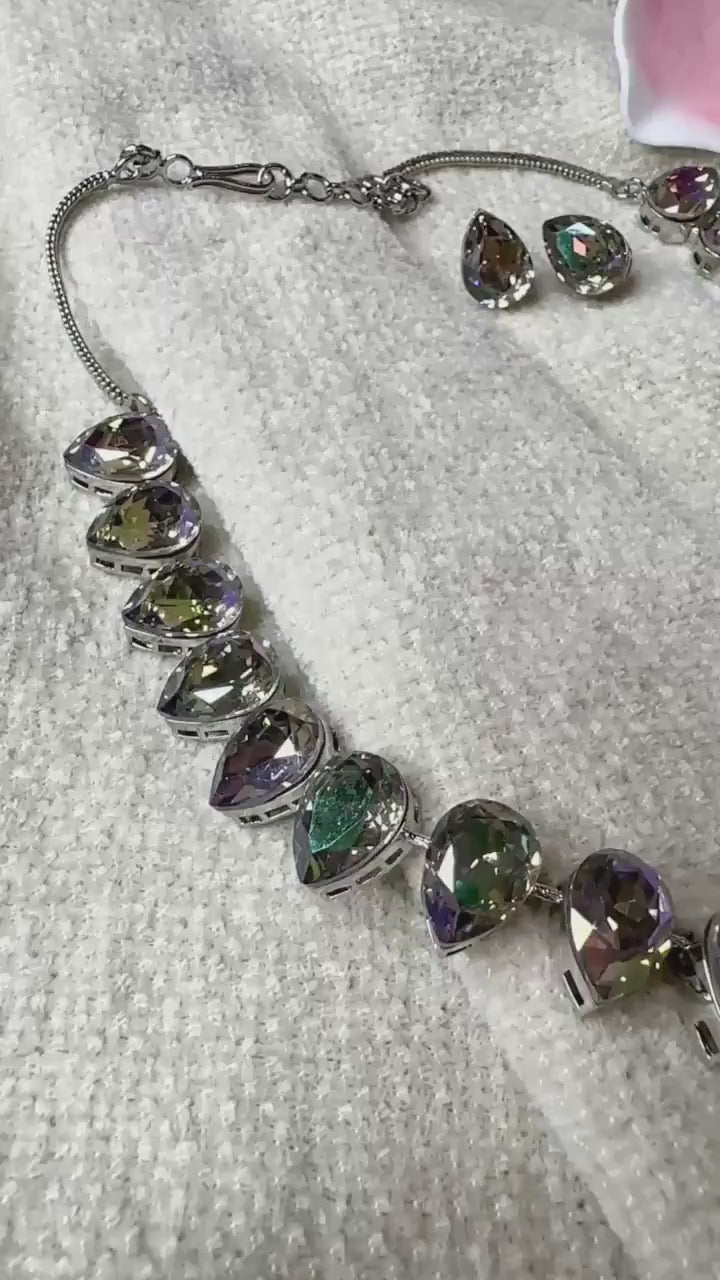beautifully crafted Sworaski crystals necklace set with studs/wedding /silver plated/rhodium finish adjustable.